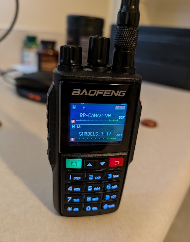 A Baofeng UV-22 radio showing 2x channels programmed on it