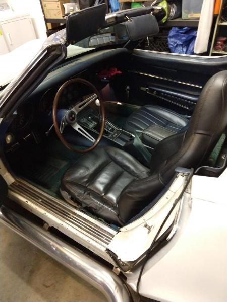 C6 corvette seat in a C3 Corvette, photo taken from the rear towards the front of the corvette.