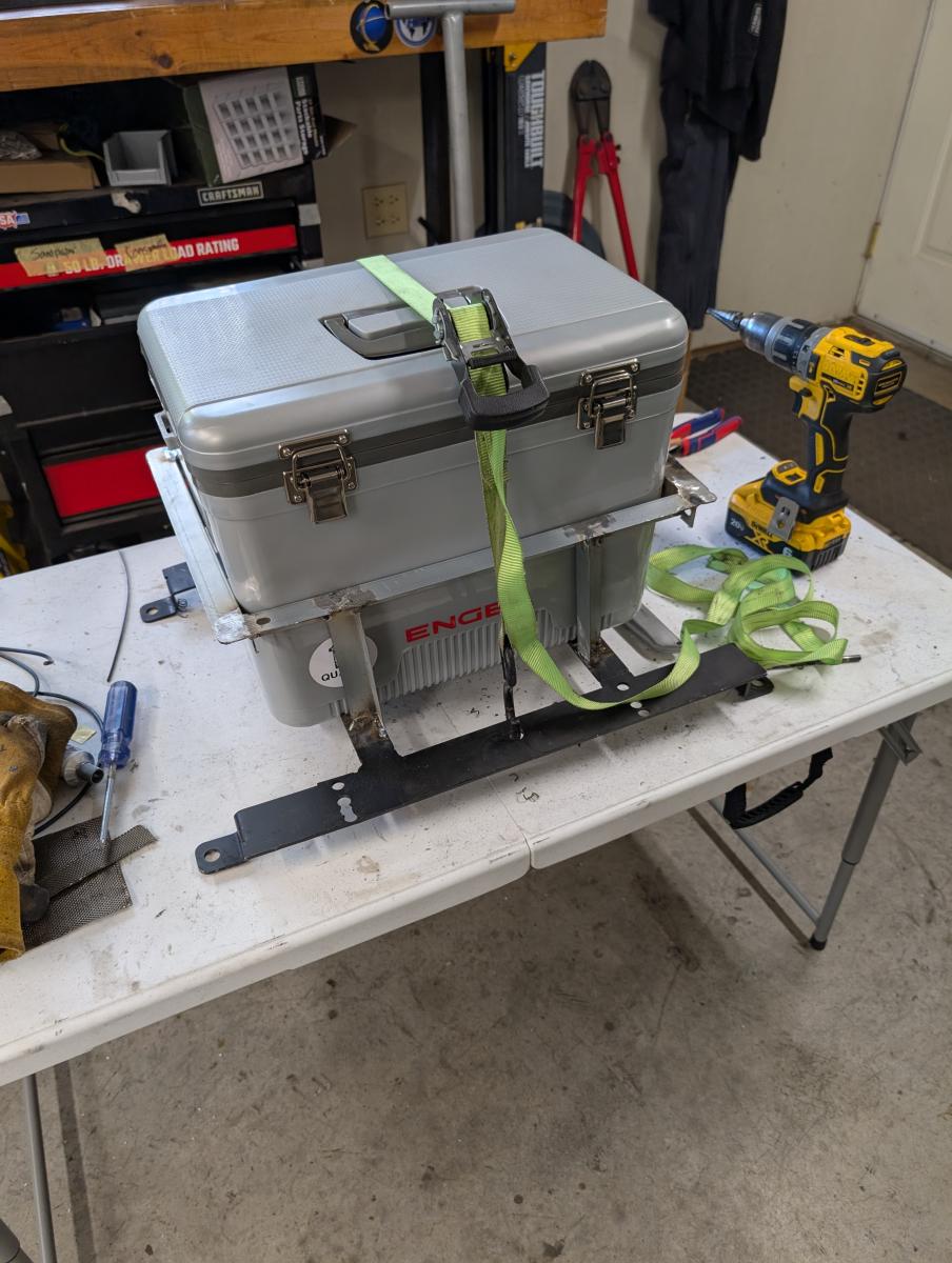 The custom c5 corvette DIY cool shirt cooler with bracket and a ratch strap to hold it in place.