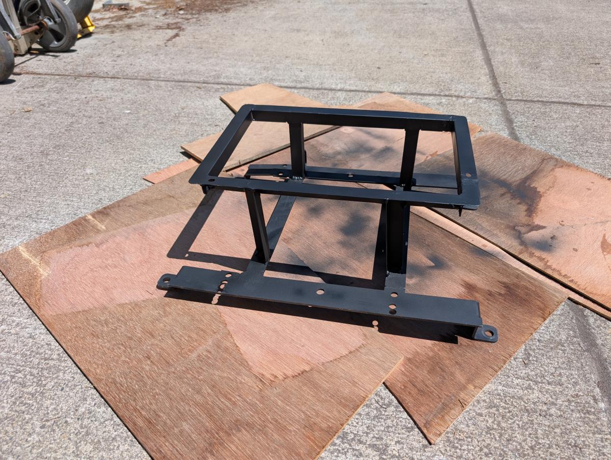 The DIY c5 corvette cool suit passenger seat bracket and frame, with no cooler, freshly painted.
