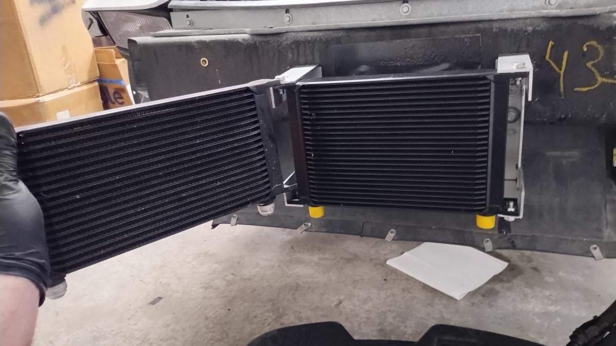 A 19 row and 25 row Evil Energy oil cooler side by side on a C5 Corvette. The 25 row is approximately 25% larger.