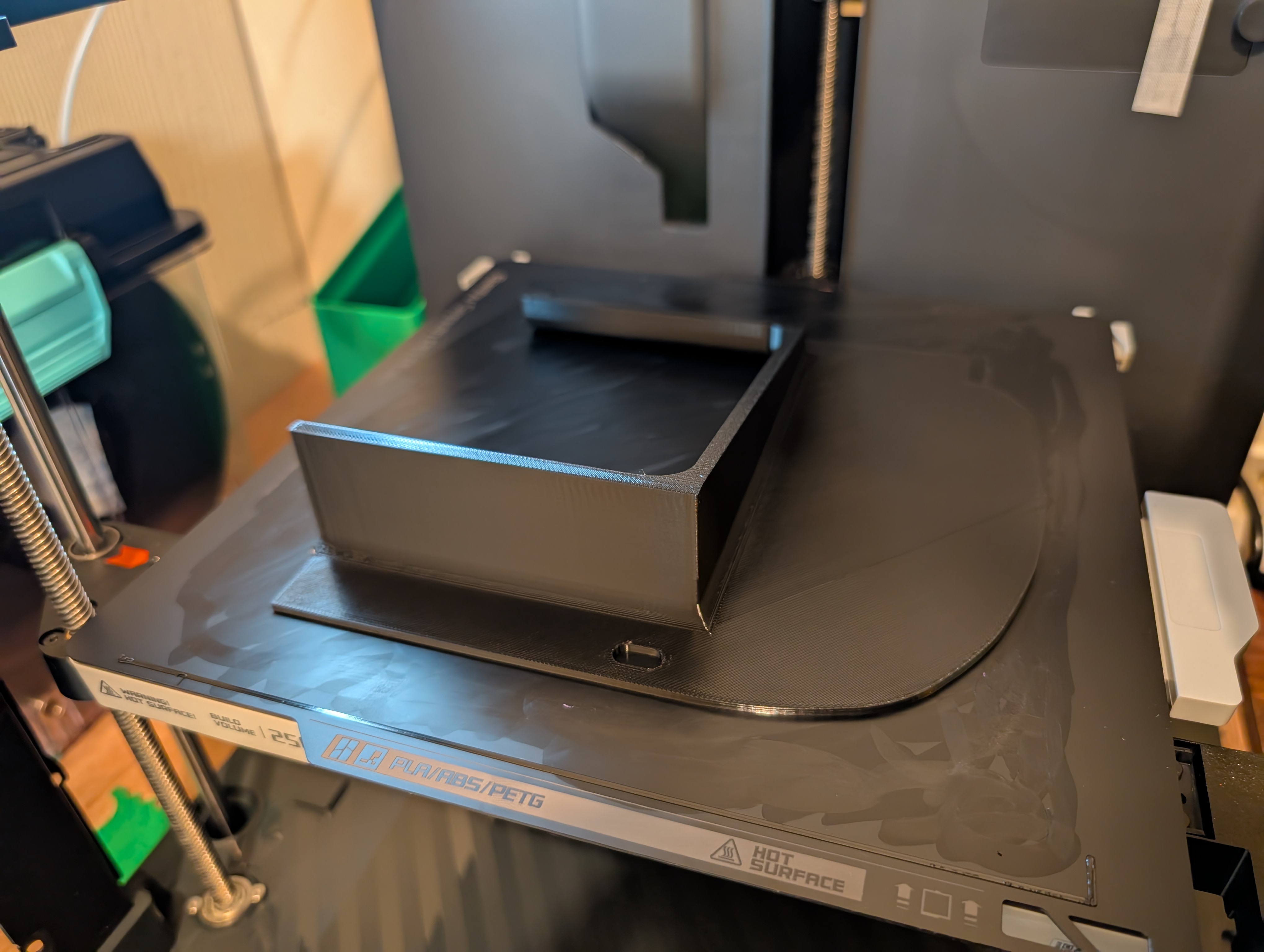 Shred Jesse's 3d printer, with one half of the full oil cooler ducting being printed.