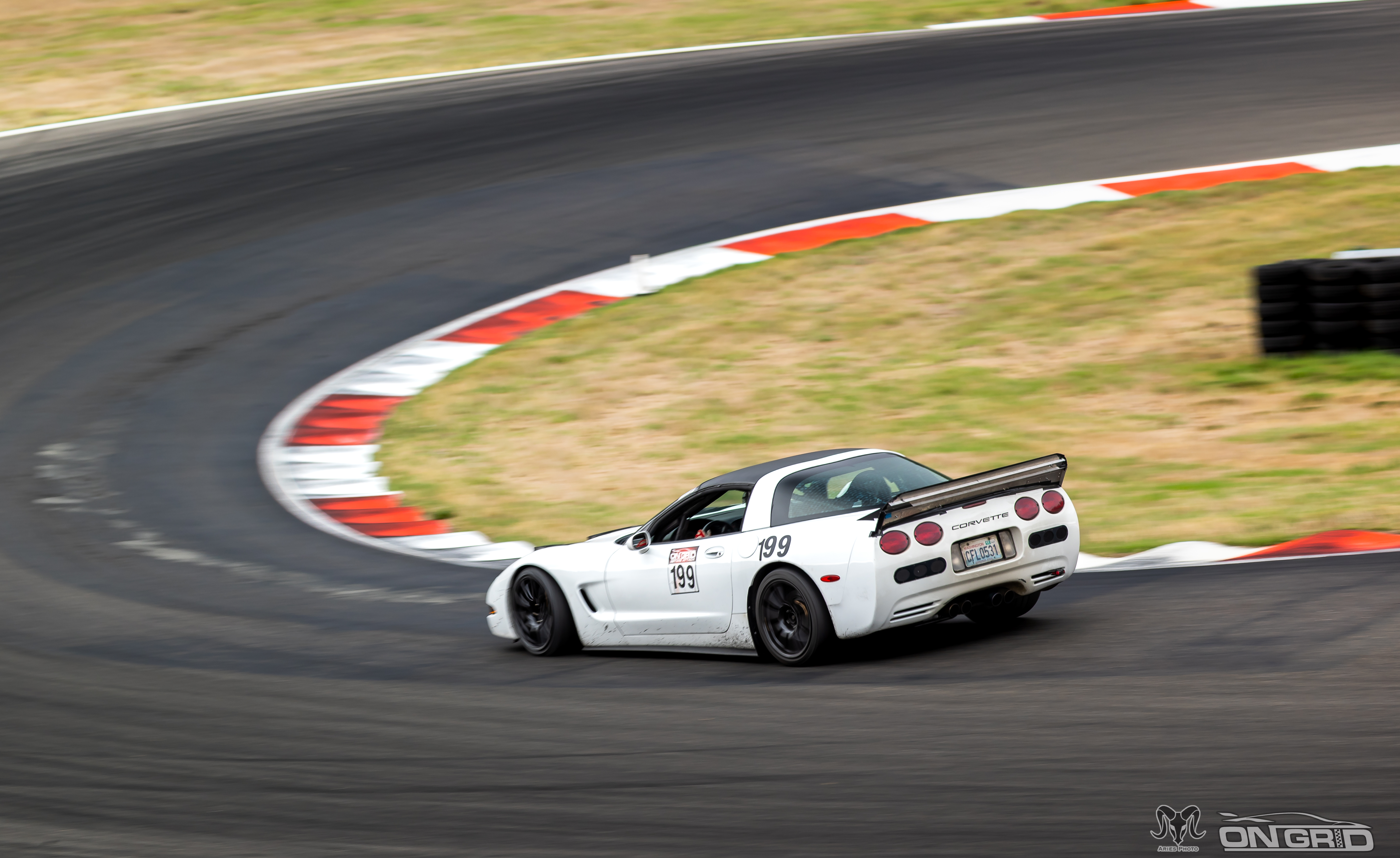 White C5 Corvette entering "the complex" at the Ridge