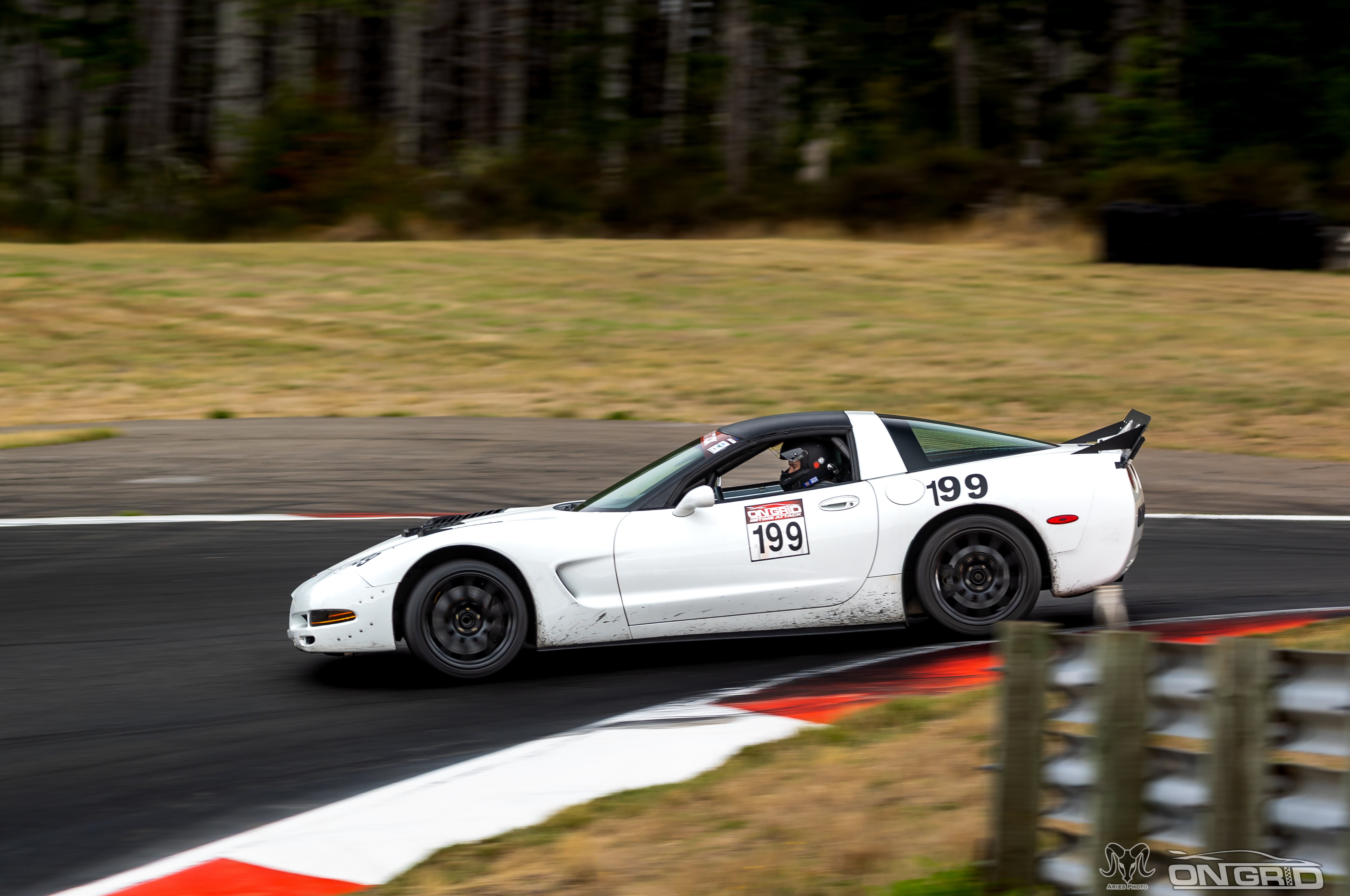 White C5 Corvette dropping into the Complex at the Ridge