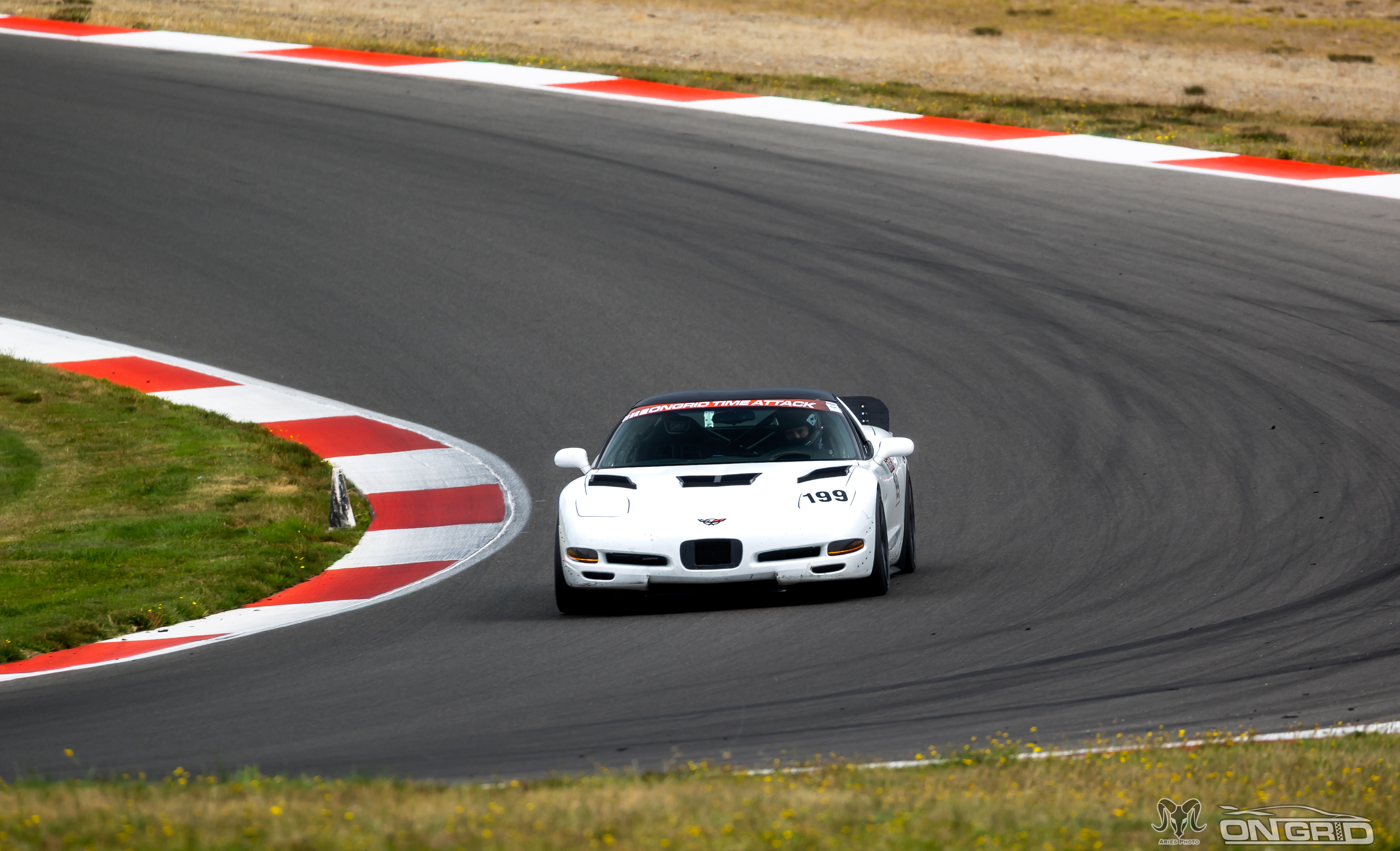 White C5 Corvette at the ridge mid corner