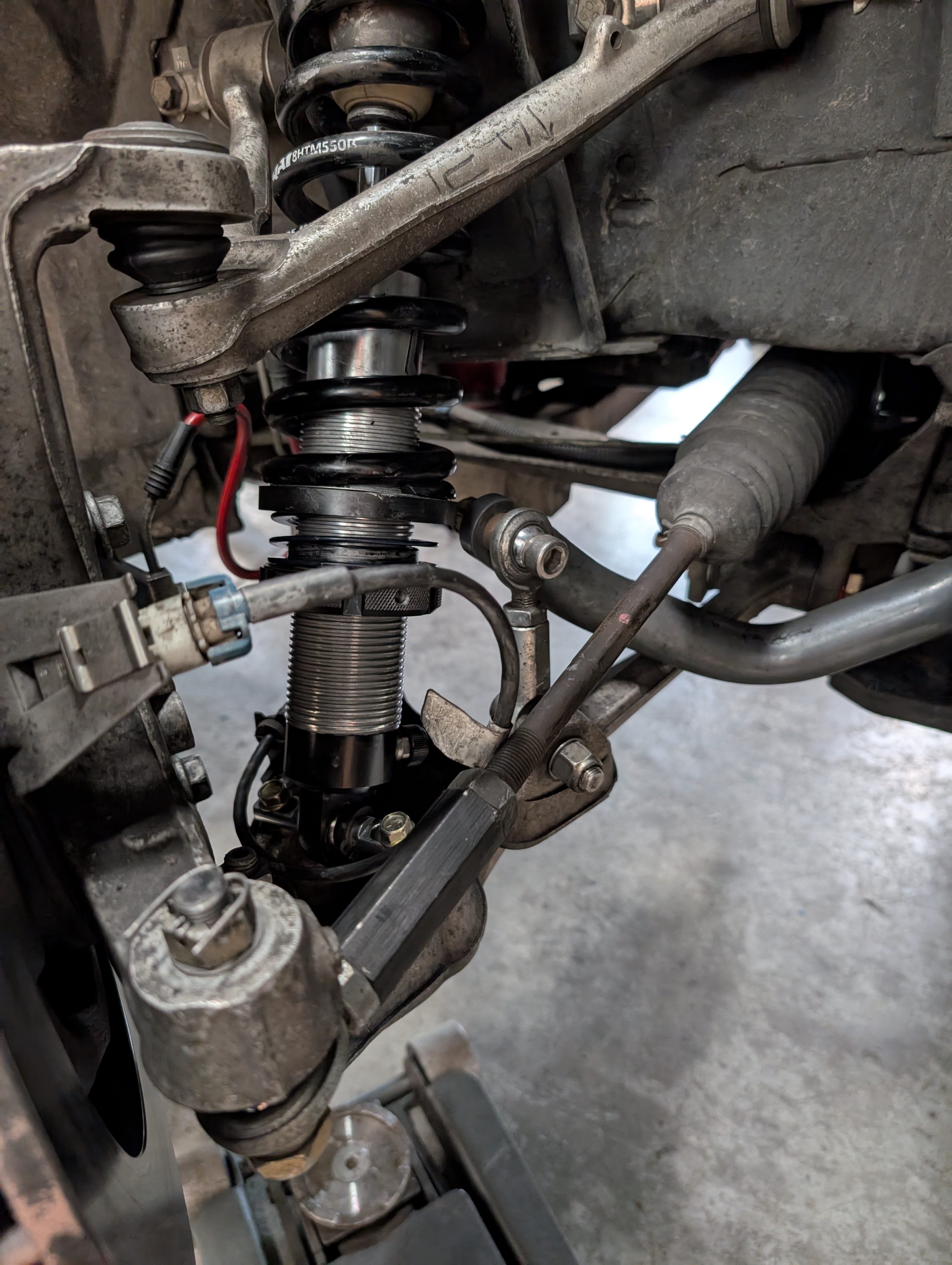 A QA1 Proma star mounted up front on Shred Jesse's C5 Corvette.