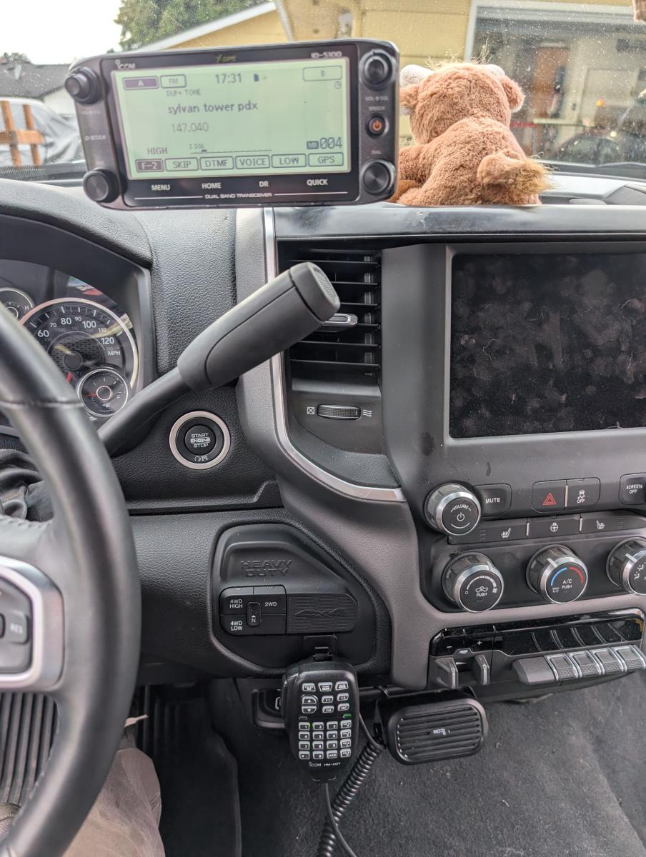 A picture of an ICOM-5100 and all essential accessories mounted inside a ram 3500.