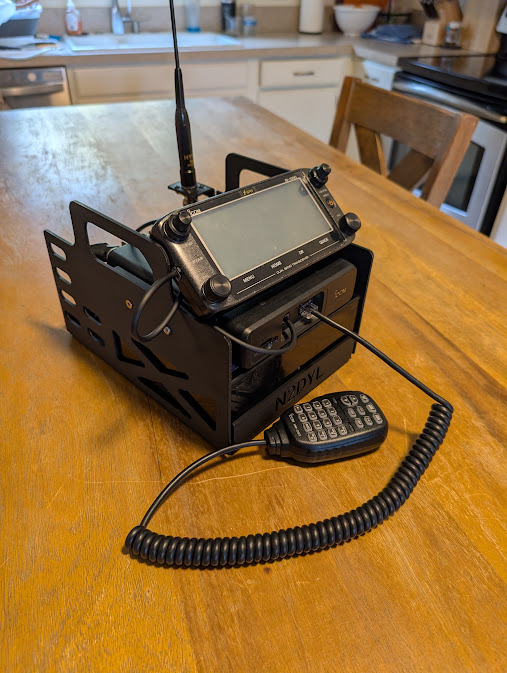 A picture of an ICOM-5100 in a custom 3d printed portable base station enclosure
