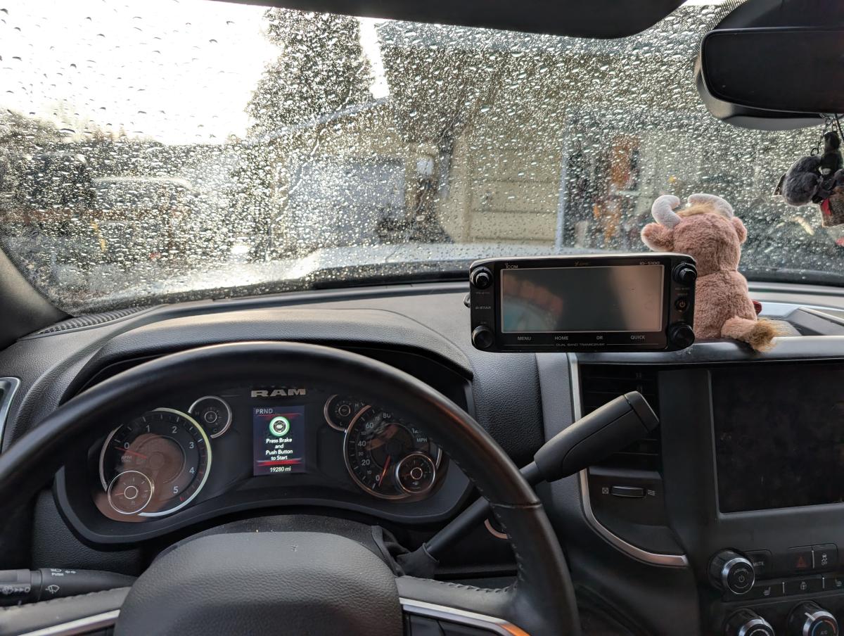 A picture of the ICOM-5100 head unit mounted on the dash of a 2024 Ram-3500