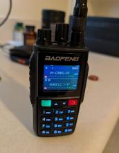 A Baofeng UV-22 radio showing 2x channels programmed on it