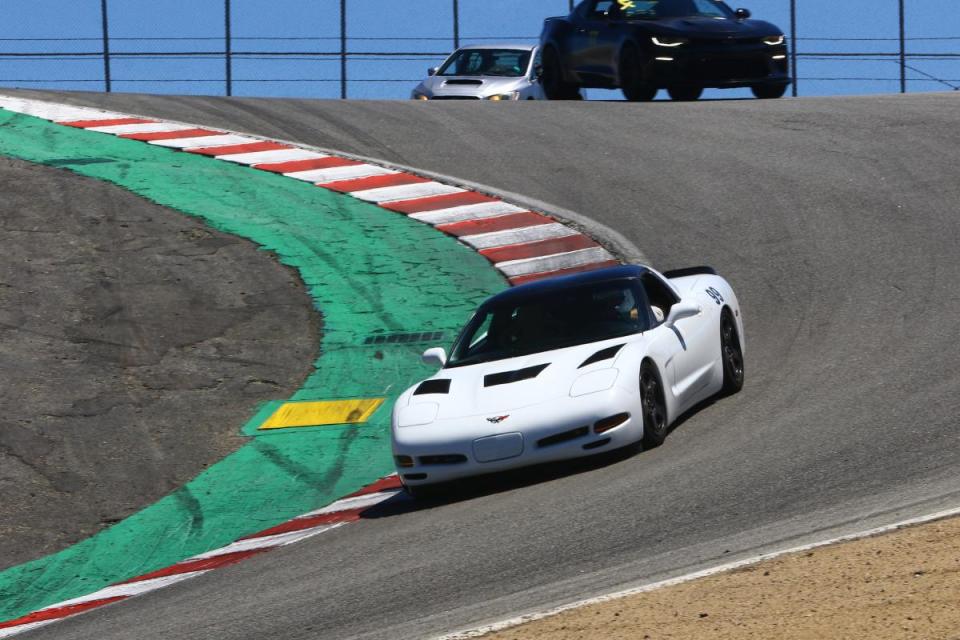 Jesse in the 99 Corvette navigating the Laguna Seca Corkscrew