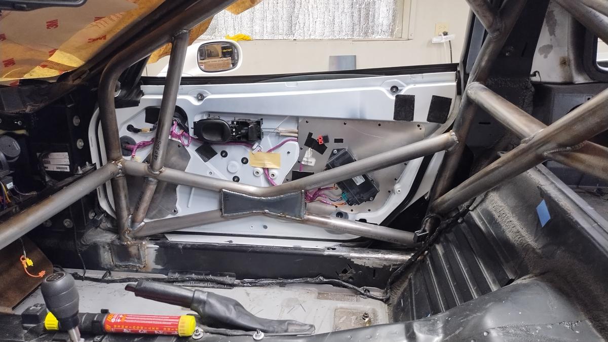 The passenger side door closed, demonstrating the final state of the notching and door plating