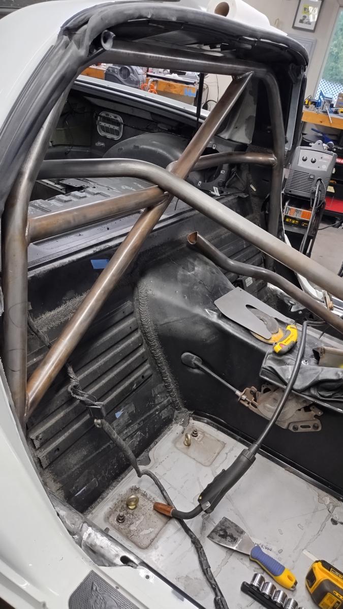 C5 Corvette trackspec roll cage main hoop initial placement in the car.